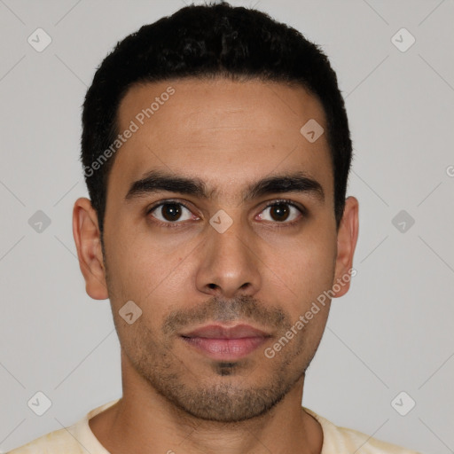 Neutral latino young-adult male with short  black hair and brown eyes