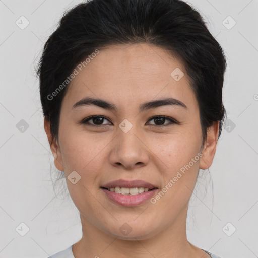 Joyful asian young-adult female with medium  brown hair and brown eyes