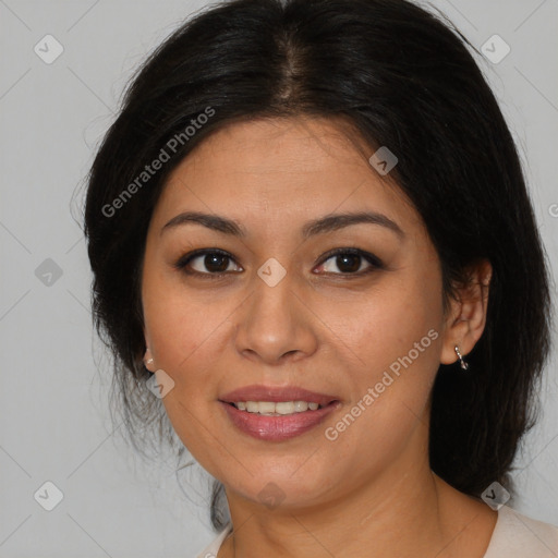 Joyful latino young-adult female with medium  brown hair and brown eyes