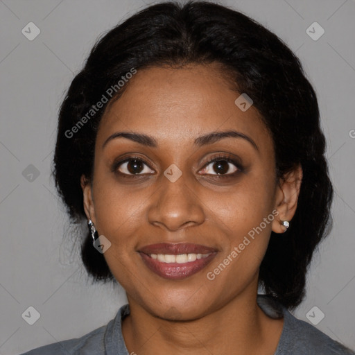 Joyful black young-adult female with medium  black hair and brown eyes