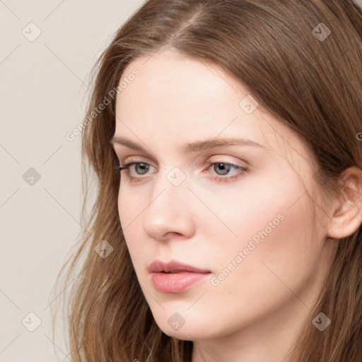 Neutral white young-adult female with long  brown hair and grey eyes