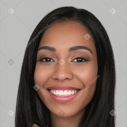 Joyful latino young-adult female with long  black hair and brown eyes