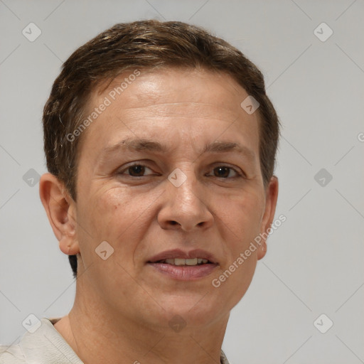 Joyful white adult female with short  brown hair and brown eyes