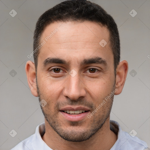 Joyful white adult male with short  brown hair and brown eyes