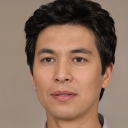 Neutral asian adult male with short  black hair and brown eyes