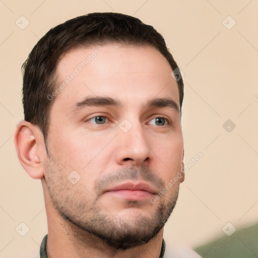 Neutral white young-adult male with short  brown hair and brown eyes