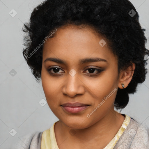 Joyful black young-adult female with long  black hair and brown eyes