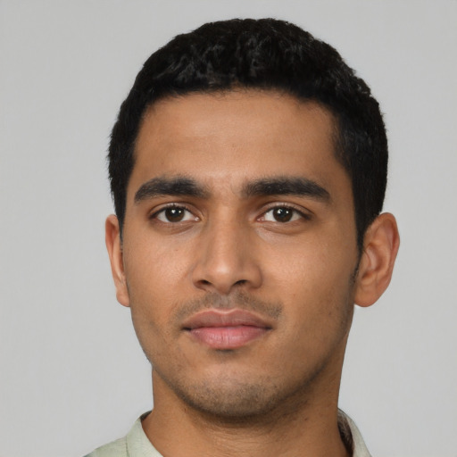 Neutral latino young-adult male with short  black hair and brown eyes