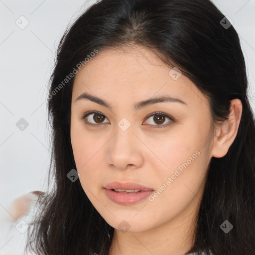 Joyful asian young-adult female with long  brown hair and brown eyes