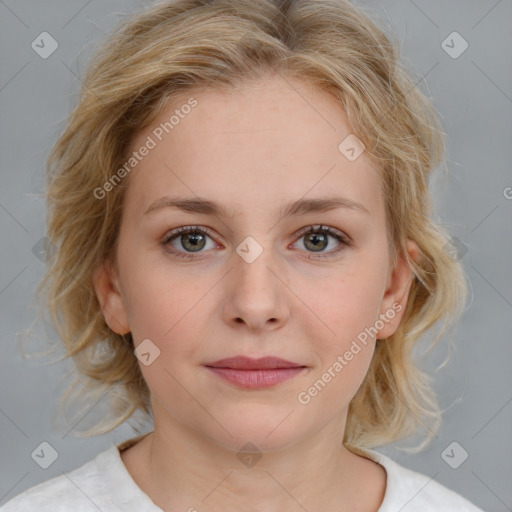 Joyful white young-adult female with medium  brown hair and blue eyes