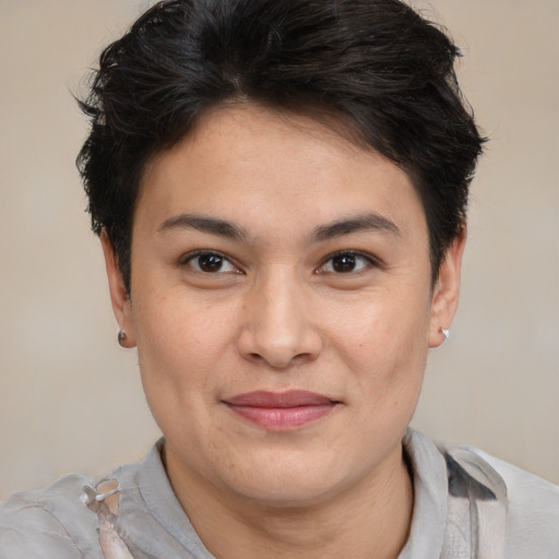 Joyful white adult female with short  brown hair and brown eyes