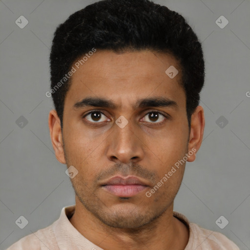 Neutral latino young-adult male with short  black hair and brown eyes