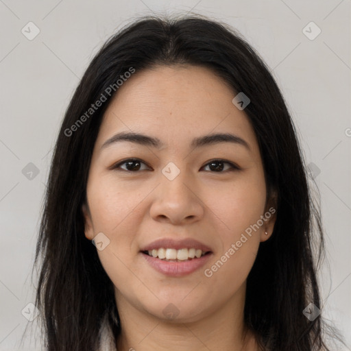 Joyful latino young-adult female with long  brown hair and brown eyes