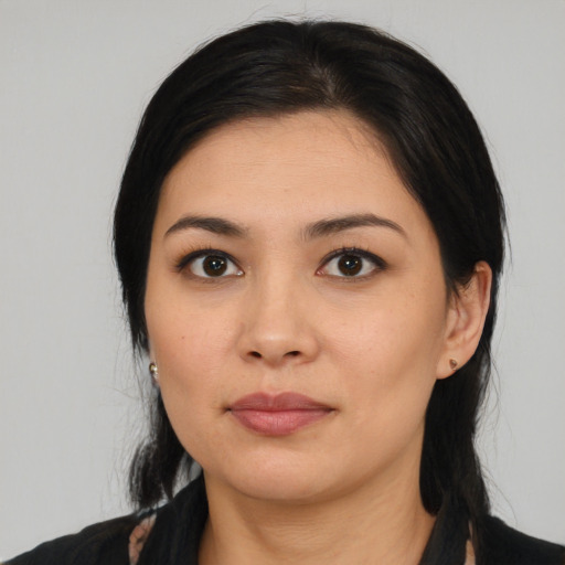 Neutral white young-adult female with medium  black hair and brown eyes