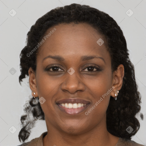 Joyful black young-adult female with medium  brown hair and brown eyes