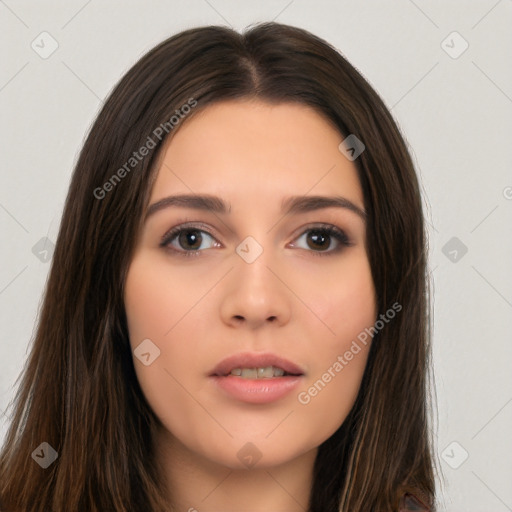 Neutral white young-adult female with long  brown hair and brown eyes