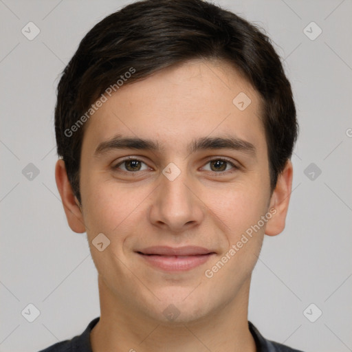 Joyful white young-adult male with short  brown hair and brown eyes