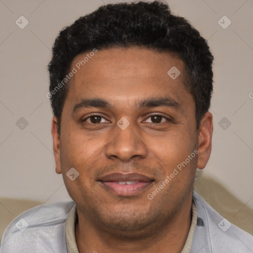 Joyful black young-adult male with short  black hair and brown eyes