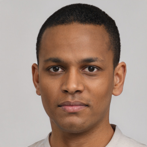 Neutral black young-adult male with short  black hair and brown eyes