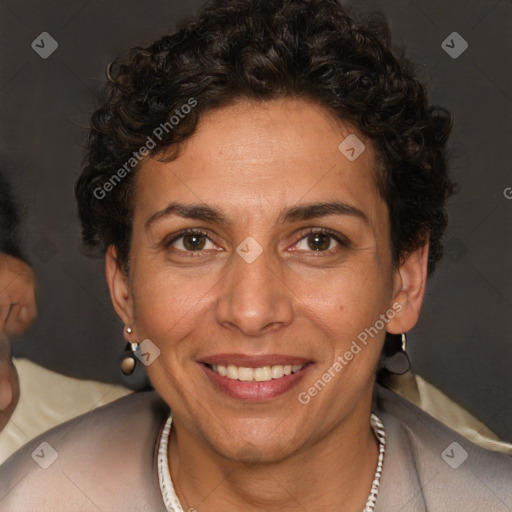 Joyful white adult female with short  brown hair and brown eyes