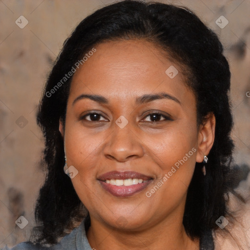 Joyful black adult female with medium  brown hair and brown eyes