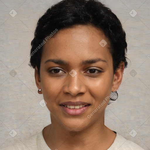 Joyful black young-adult female with short  black hair and brown eyes