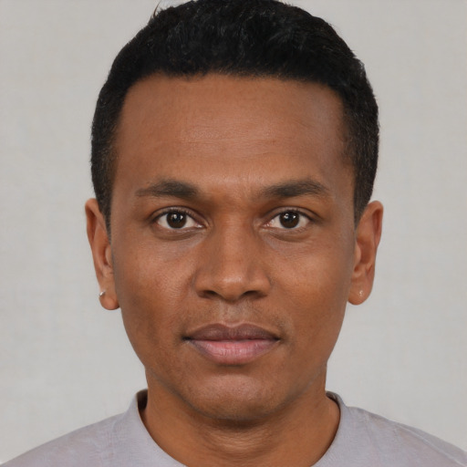 Neutral black young-adult male with short  black hair and brown eyes