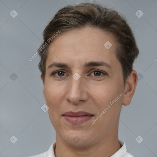 Joyful white adult female with short  brown hair and brown eyes