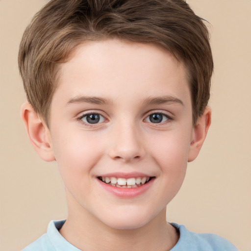 Joyful white child male with short  brown hair and brown eyes