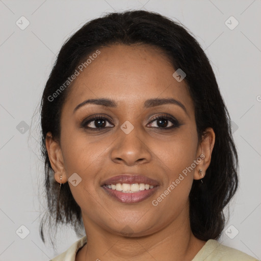 Joyful black young-adult female with medium  brown hair and brown eyes