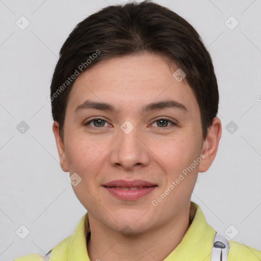 Joyful white young-adult female with short  brown hair and brown eyes