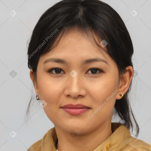 Joyful asian young-adult female with medium  brown hair and brown eyes