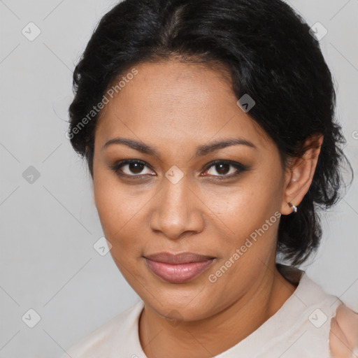 Joyful black adult female with short  brown hair and brown eyes