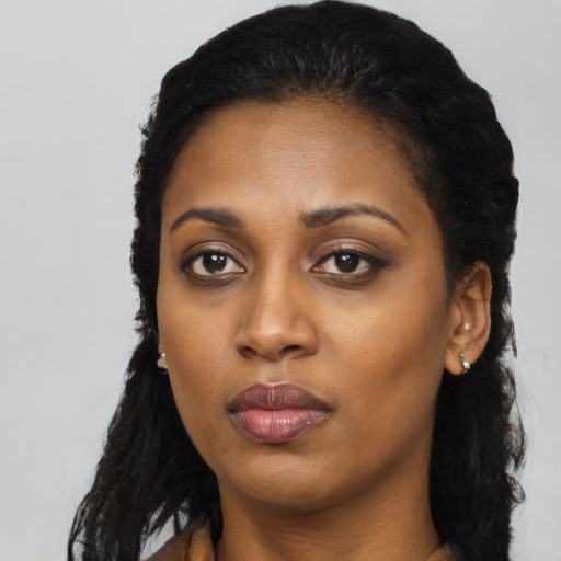 Neutral latino young-adult female with long  black hair and brown eyes