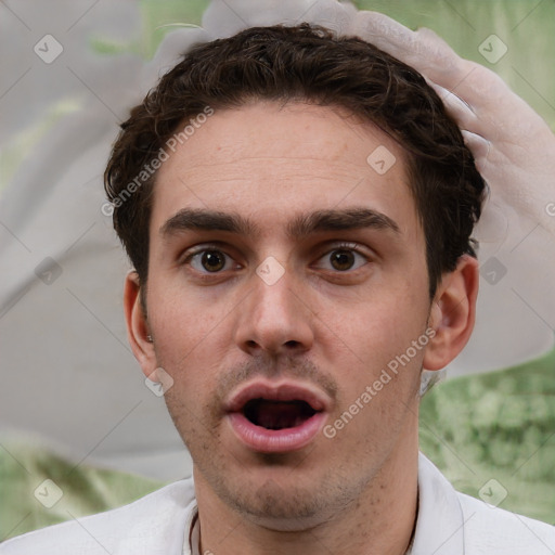 Neutral white young-adult male with short  brown hair and brown eyes