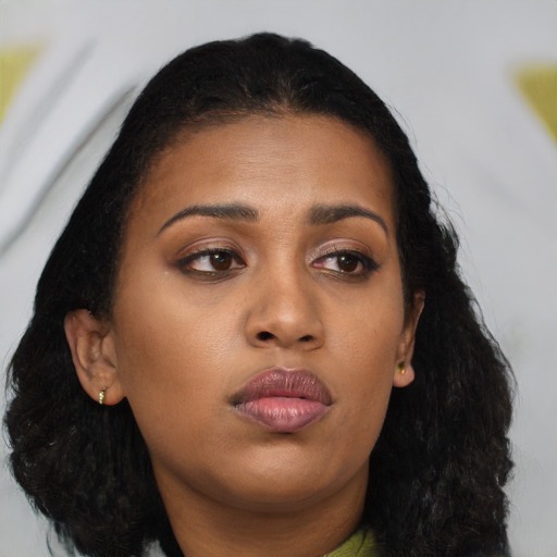 Neutral black young-adult female with long  black hair and brown eyes
