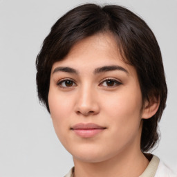 Joyful white young-adult female with medium  brown hair and brown eyes