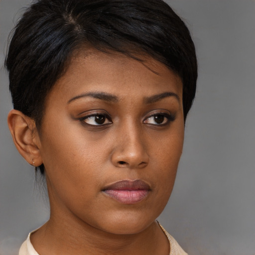 Neutral asian young-adult female with short  brown hair and brown eyes