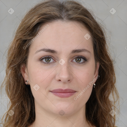 Joyful white young-adult female with long  brown hair and green eyes