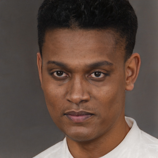 Neutral latino young-adult male with short  black hair and brown eyes