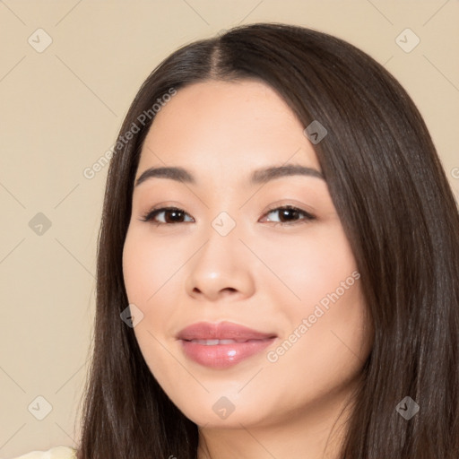 Joyful white young-adult female with long  black hair and brown eyes