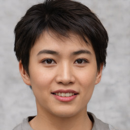 Joyful asian young-adult female with short  brown hair and brown eyes