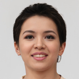 Joyful asian young-adult female with short  brown hair and brown eyes