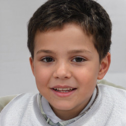 Joyful white child male with short  brown hair and brown eyes