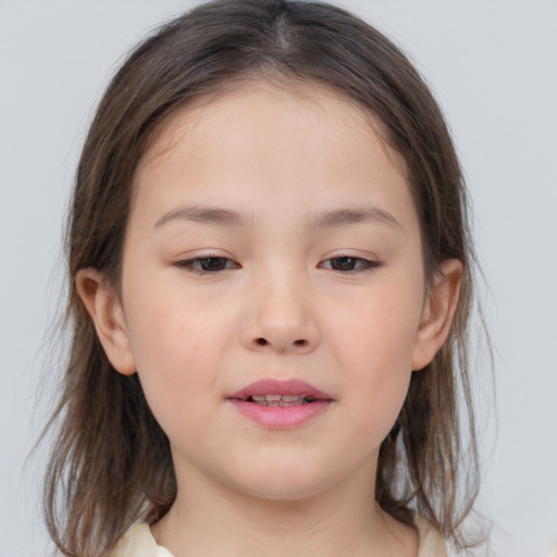 Joyful white child female with medium  brown hair and brown eyes