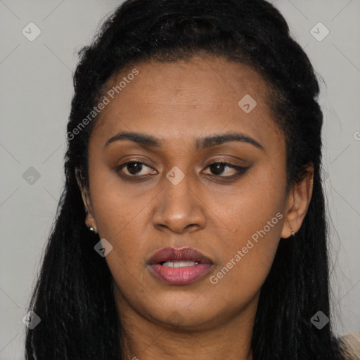Joyful latino young-adult female with long  black hair and brown eyes