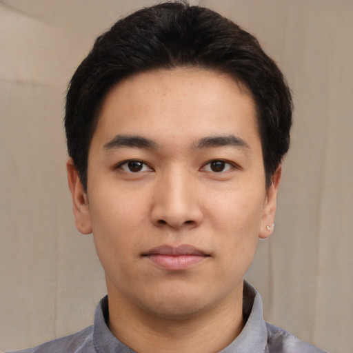Neutral asian young-adult male with short  black hair and brown eyes