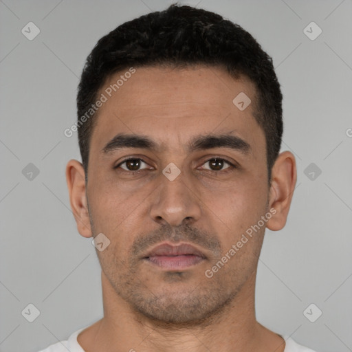 Neutral white young-adult male with short  black hair and brown eyes