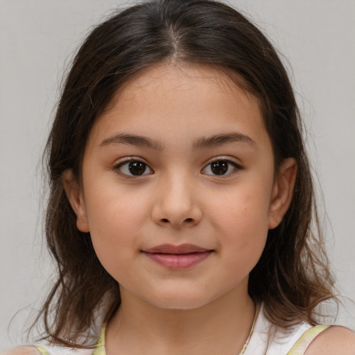 Joyful white child female with medium  brown hair and brown eyes