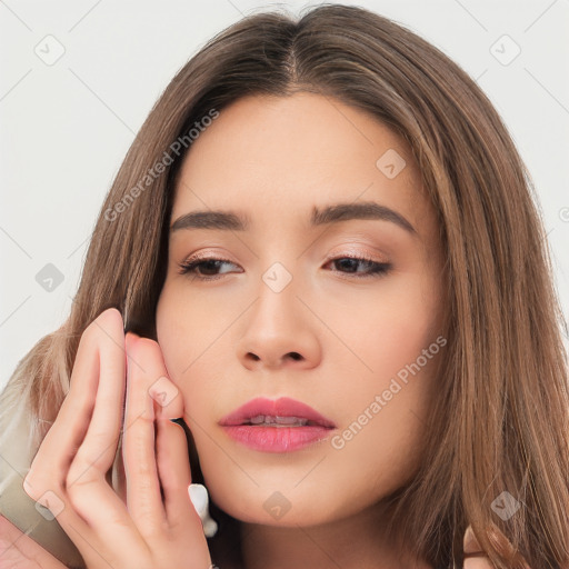 Neutral white young-adult female with long  brown hair and brown eyes